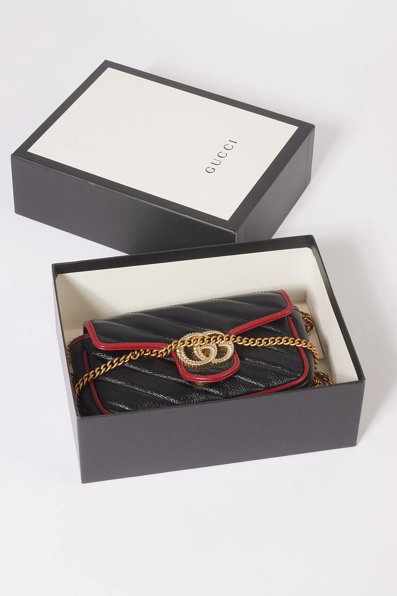 Gucci Black/Red Matelassé Diagonal Leather Torchon GG Marmont Super Mini Bag