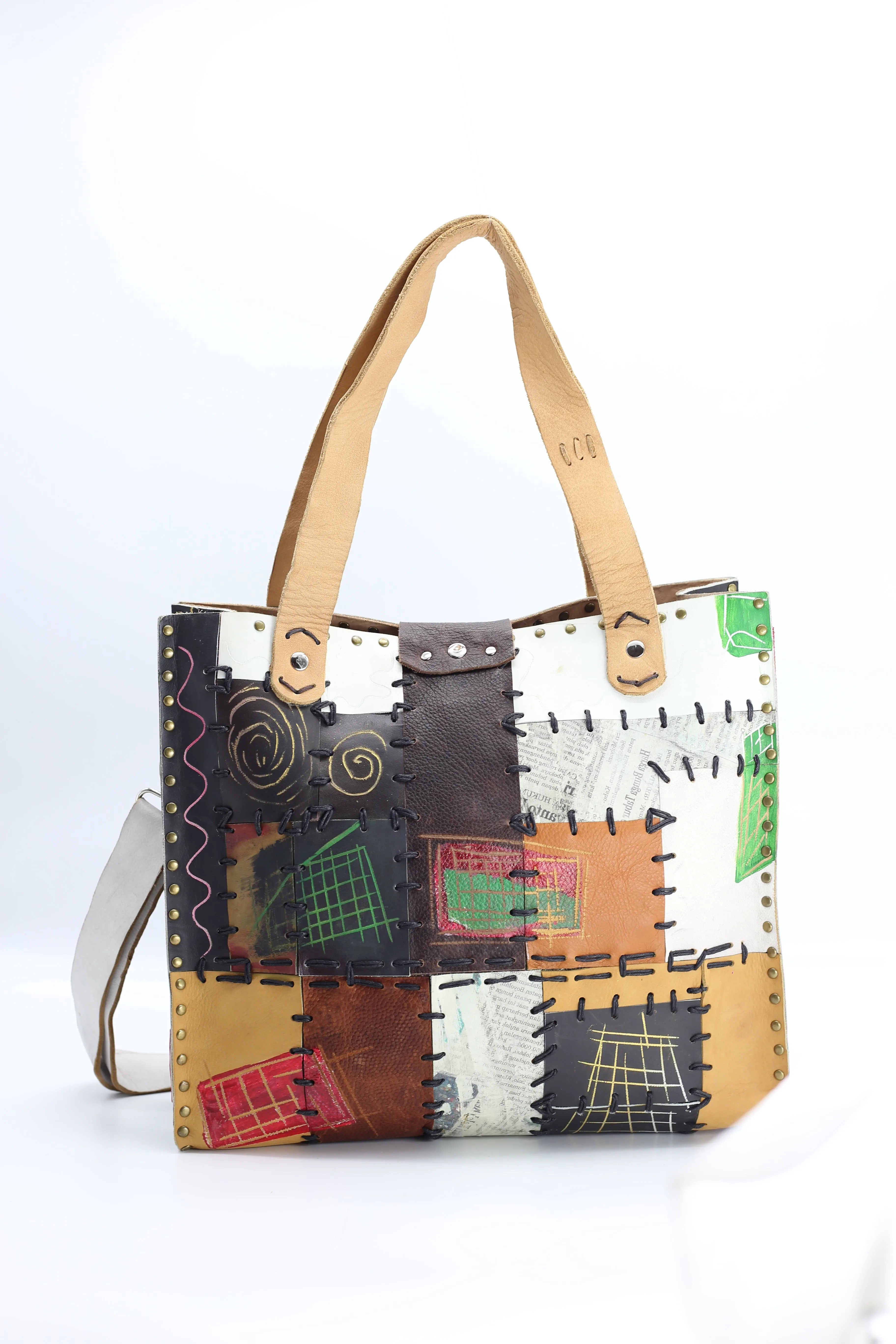 Hand Crafted Cross Body Tote Bag With A Strap From Recycled Leather