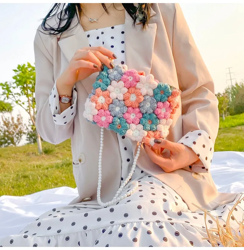 Hand woven woolen bag with puff flowers