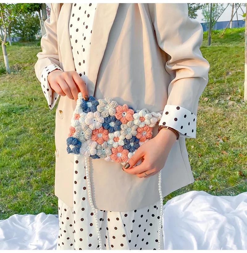 Hand woven woolen bag with puff flowers