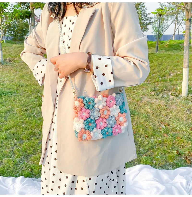 Hand woven woolen bag with puff flowers