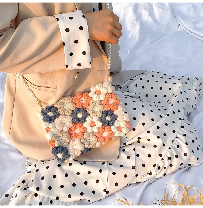 Hand woven woolen bag with puff flowers