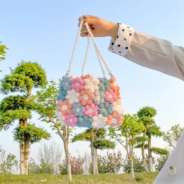 Hand woven woolen bag with puff flowers