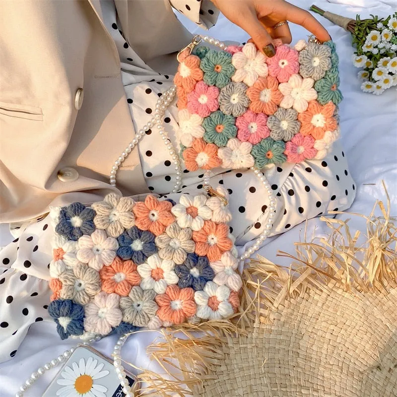 Hand woven woolen bag with puff flowers