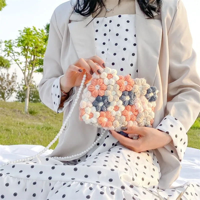 Hand woven woolen bag with puff flowers