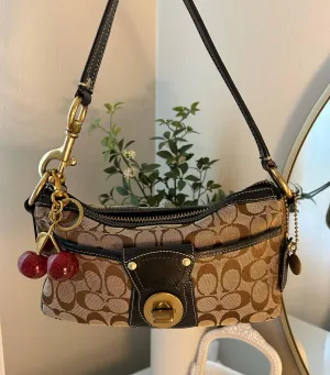 HENRYVINTUS™ black and tan coach vintage bag