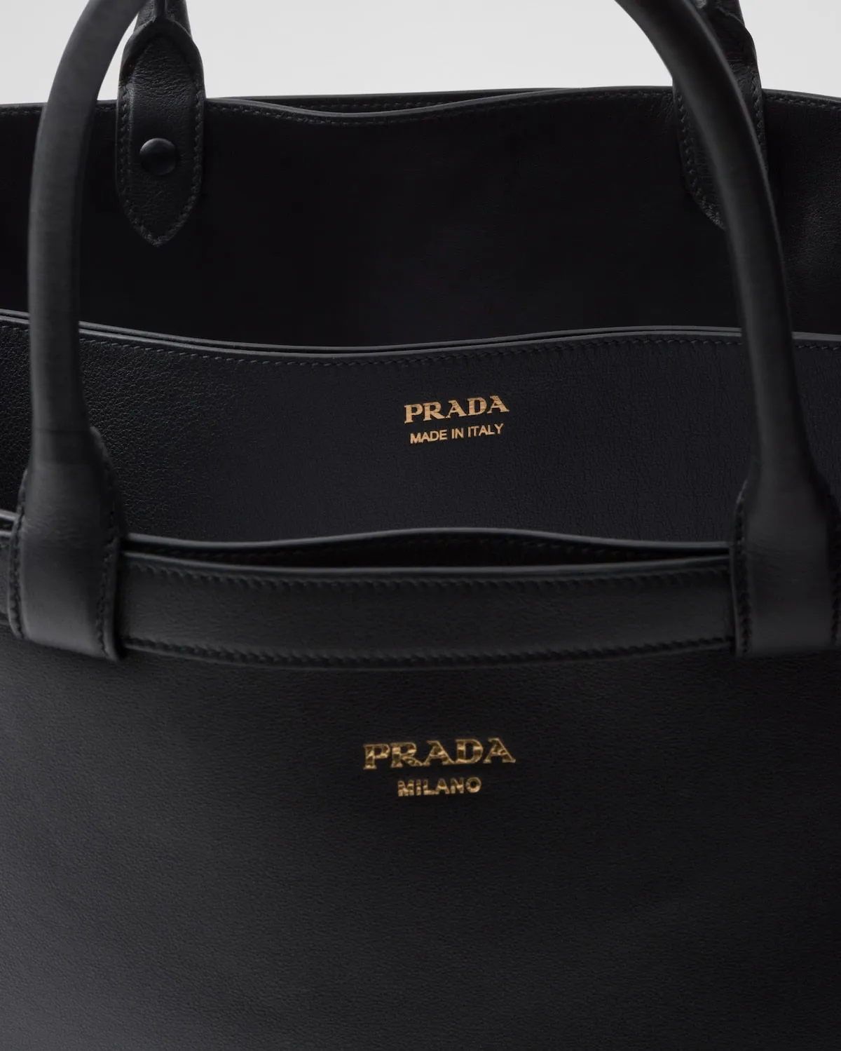 Prada Buckle leather handbag with double belt