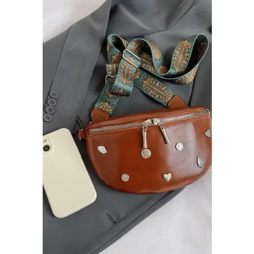 Stylish Leather Sling Bag with Unique Patterned Strap