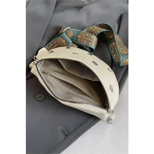 Stylish Leather Sling Bag with Unique Patterned Strap