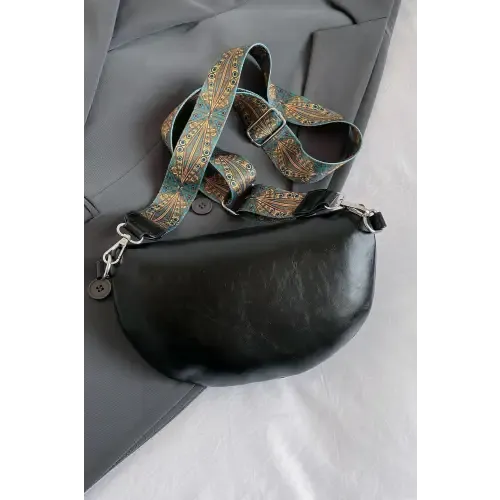 Stylish Leather Sling Bag with Unique Patterned Strap